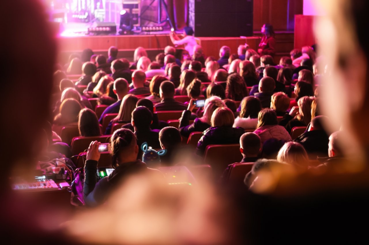 audience-enjoying-a-concert-performance-with-stage-2026-03-23-23-37-19-utc